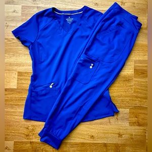 NEVER WORN GREY’S ANATOMY Royal Blue Scrubs Set.  Top Sz M, Pants Sz Sm Petite